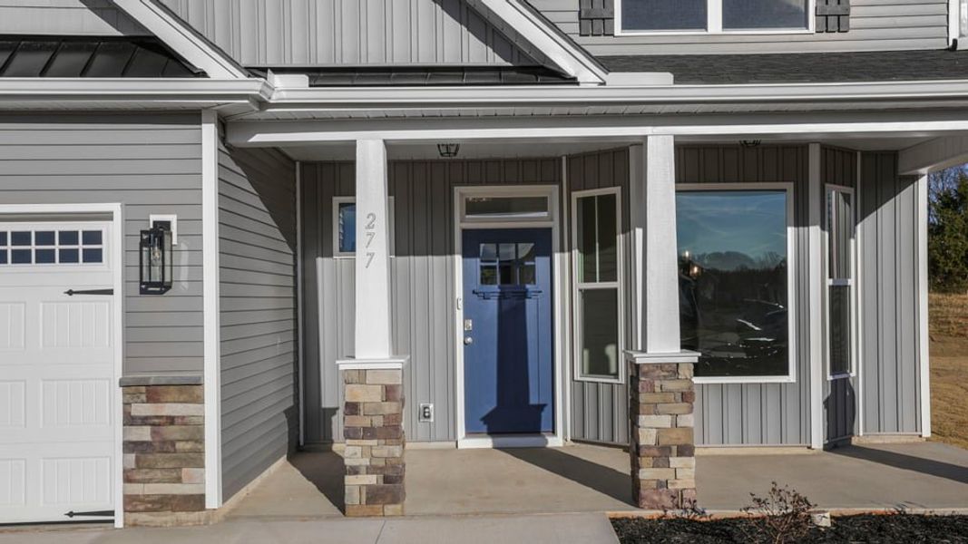 Exterior details and patio area of a home in Edgewood Estates, Greenville (Image 3).