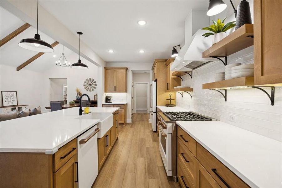 Open concept kitchen with vaulted ceilings and exposed beam, and Cafe appliances! Open concept kitchen with vaulted ceilings and exposed beam, and Cafe appliances!