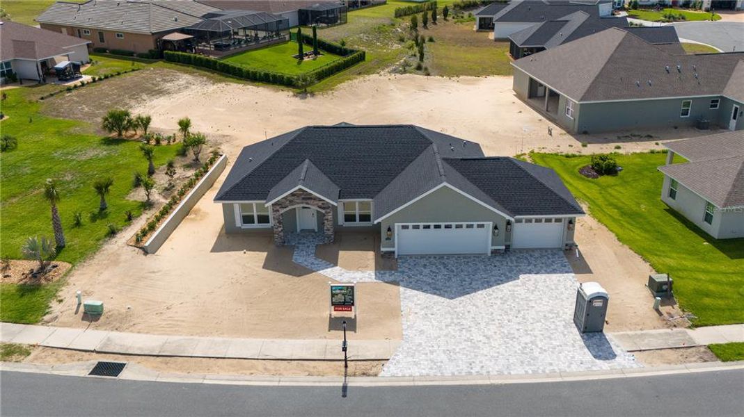 Front exterior of a new home in , Dunnellon, FL, highlighting curb appeal (Image 11).