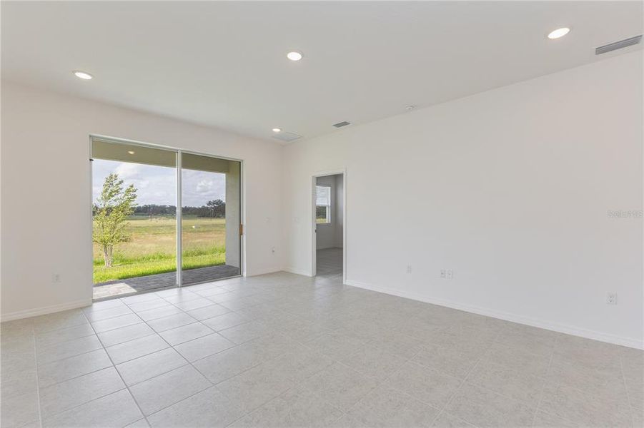 Spacious, unfurnished interior of a new home in Highfield at Twisted Oaks, Wildwood (Image 9).