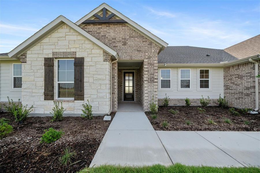 Front exterior of a new home in Fairview Meadows, New Fairview, TX, highlighting curb appeal (Image 22). Front exterior of a new home in Fairview Meadows, New Fairview, TX, highlighting curb appeal (Image 22).