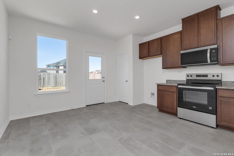 Furnished interior view inside a new home in The Granary - Heritage Collection, San Antonio (Image 3).