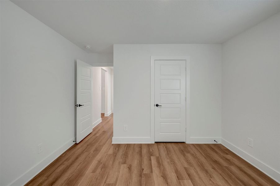 Spacious, unfurnished interior of a new home in Sorella, Tomball (Image 39).