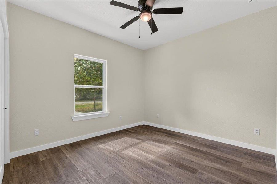 Rich wood floors lay a beautiful foundation beneath clean walls and natural window light. Rich wood floors lay a beautiful foundation beneath clean walls and natural window light.