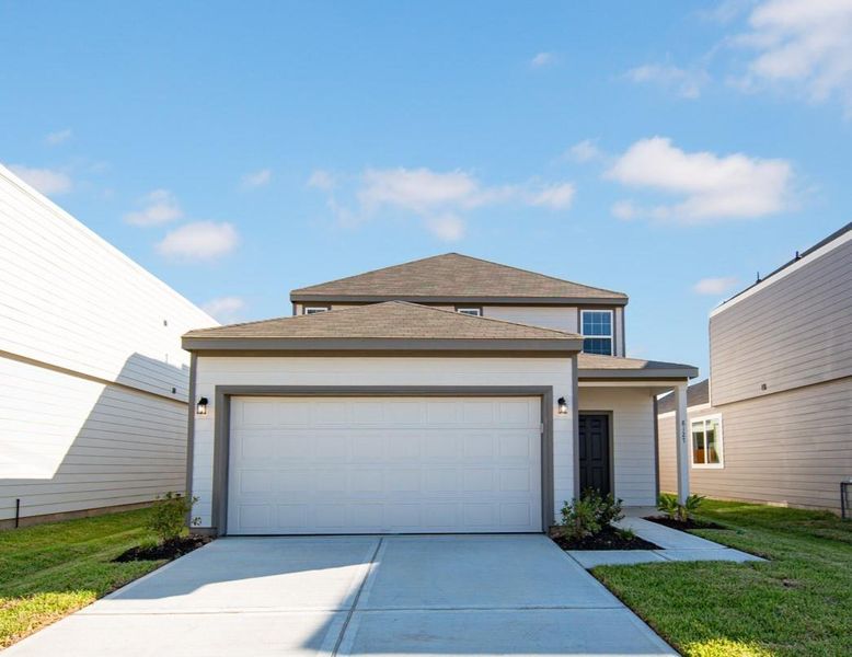 Front exterior of a new home in Wayside Village, Houston, TX, highlighting curb appeal (Image 14). Front exterior of a new home in Wayside Village, Houston, TX, highlighting curb appeal (Image 14).