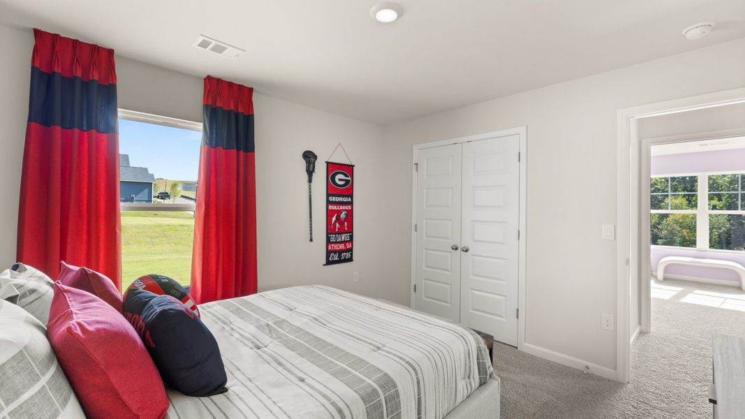 Representative furnished interior of a home built from the Halton by D.R. Horton in Brooks Station, Dacula (Image 47).