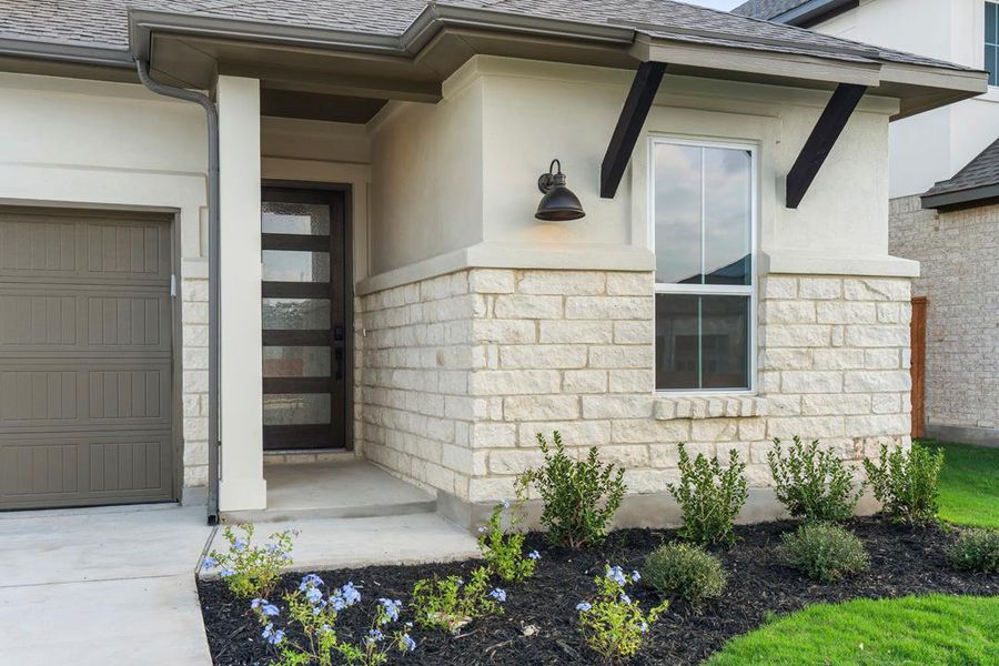 Exterior details and patio area of a home in Lariat, Liberty Hill (Image 3). Exterior details and patio area of a home in Lariat, Liberty Hill (Image 3).
