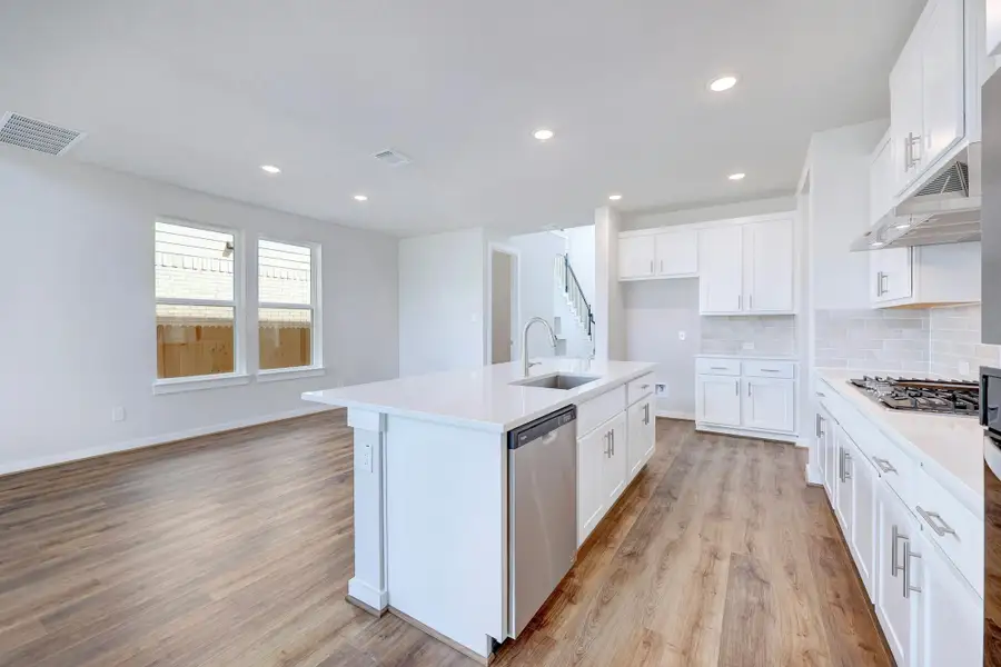 Representative furnished interior of a home built from the Travis by Scott Felder Homes in Flora, Hutto (Image 4).