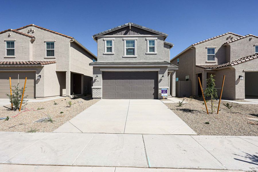 A house with a garage. A house with a garage.