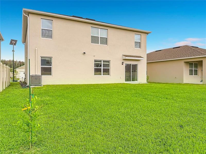 Exterior details and patio area of a home in Edgemont at Serenoa, Clermont (Image 30).