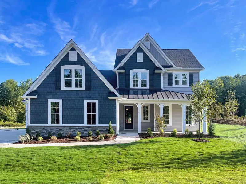 Representative exterior photo of a completed home built from the The Chandler by RobuckHomes in Baylee Ridge, Selma, NC (Image 44). Representative exterior photo of a completed home built from the The Chandler by RobuckHomes in Baylee Ridge, Selma, NC (Image 44).