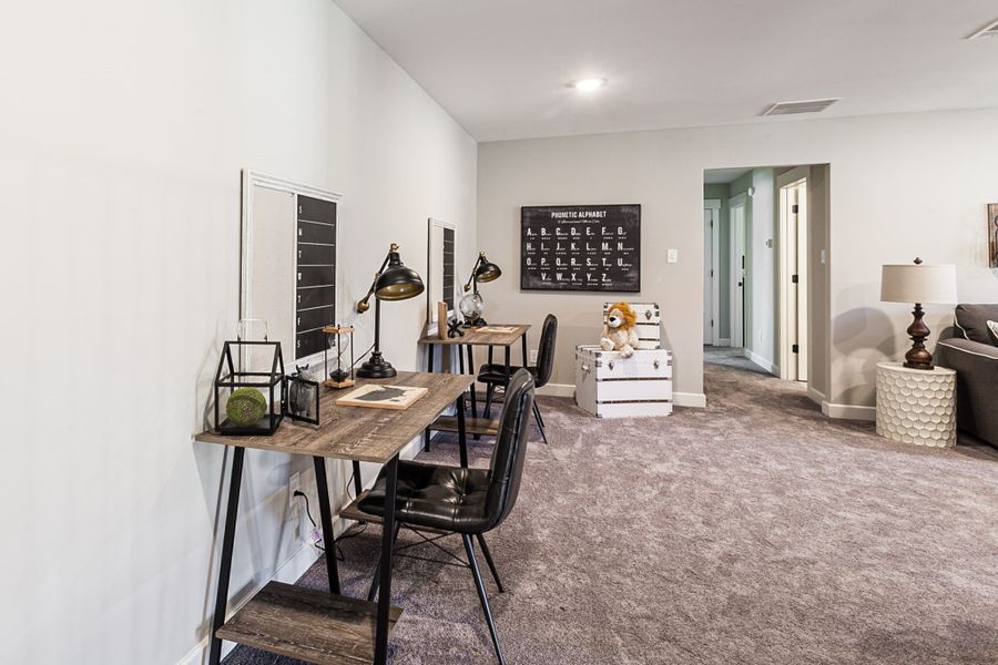 Representative furnished interior of a home built from the Bentley by Grant & Co in Manor at Hall Creek, Arlington (Image 15).