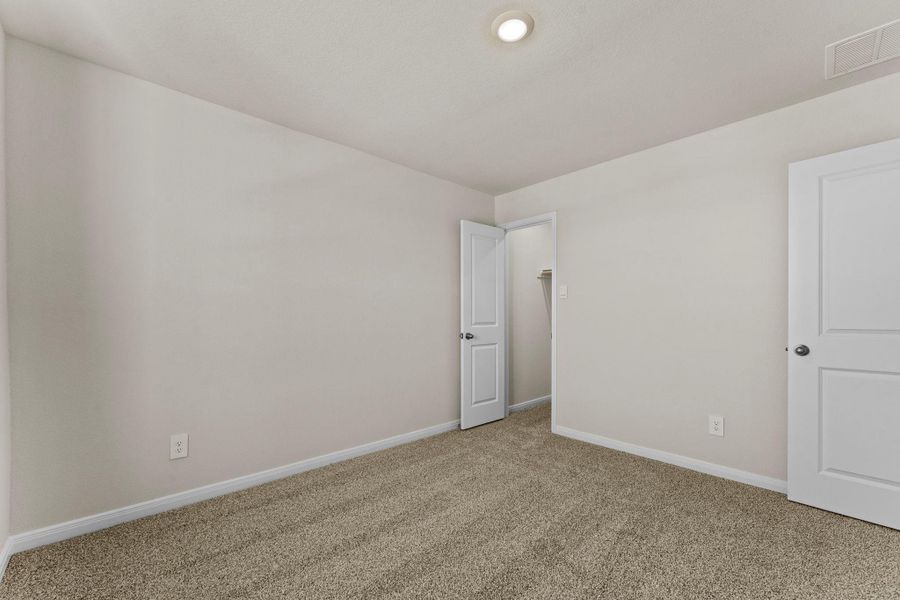 Spacious, unfurnished interior of a new home in Whisper South, San Marcos (Image 24).