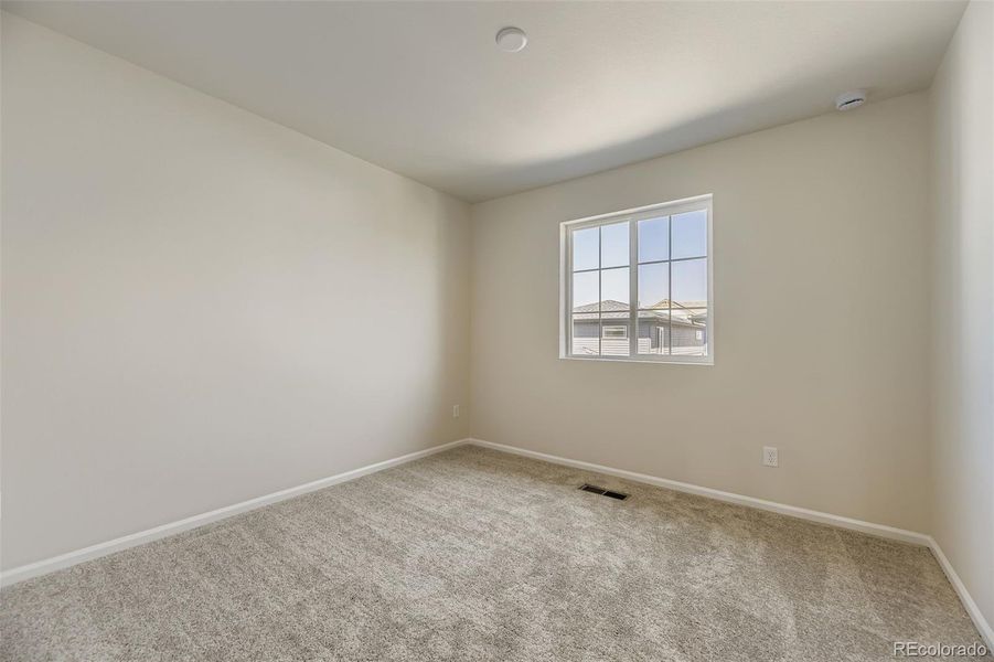 Spacious, unfurnished interior of a new home in The Villas Collection at Sterling Ranch, Littleton (Image 12).