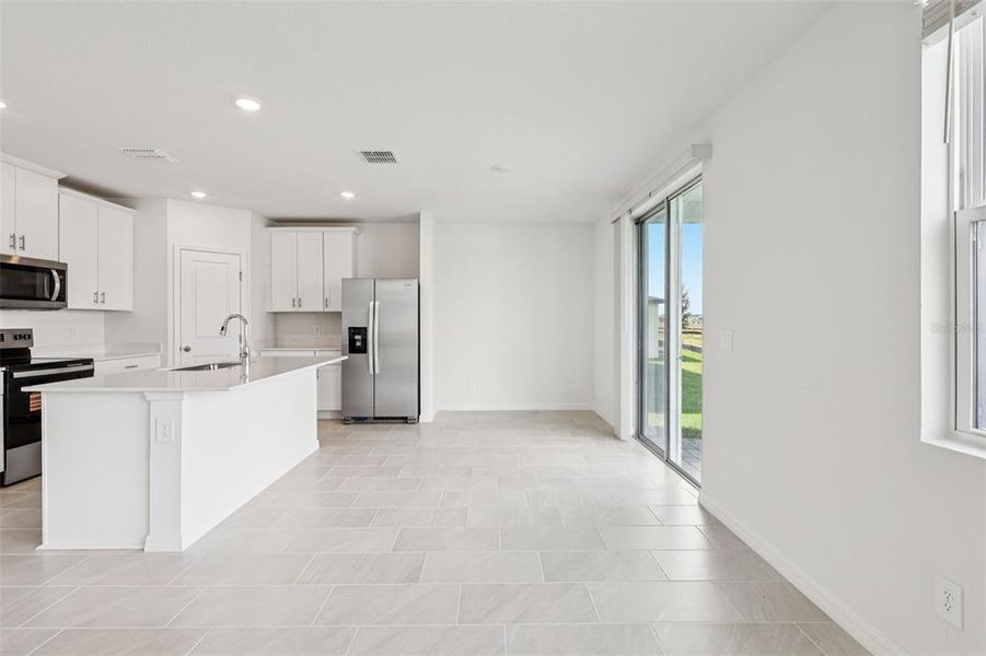 Furnished interior view inside a new home in Crosswinds - Classic Series, Haines City (Image 8). Furnished interior view inside a new home in Crosswinds - Classic Series, Haines City (Image 8).