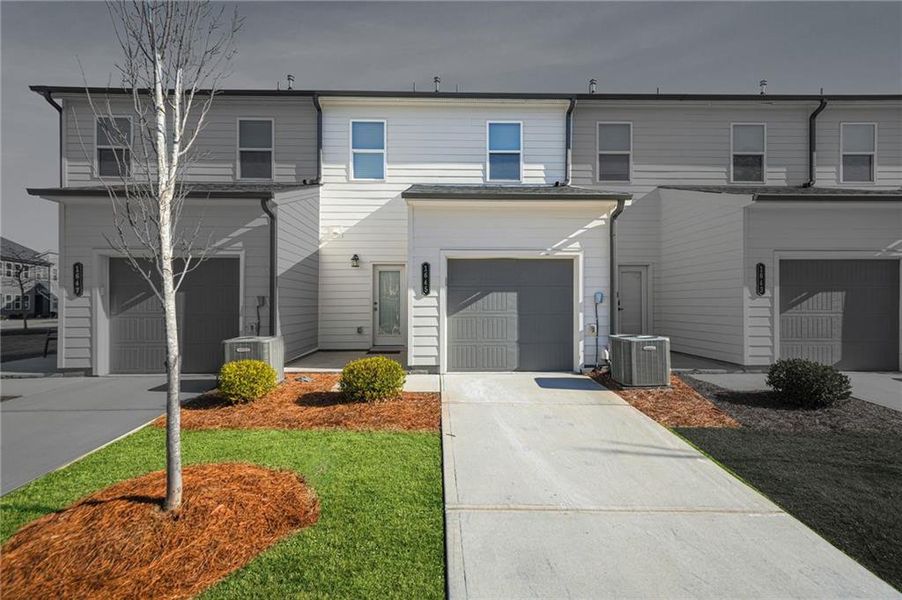 Front exterior of a new home in , Atlanta, GA, highlighting curb appeal (Image 25).