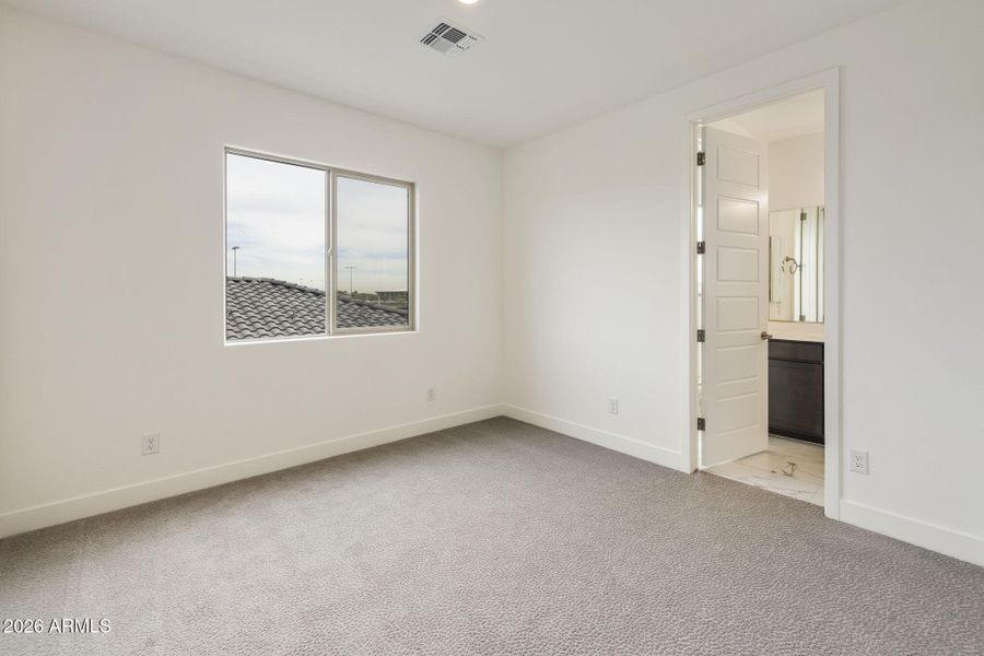 BEDROOM WITH WALK IN CLOSET