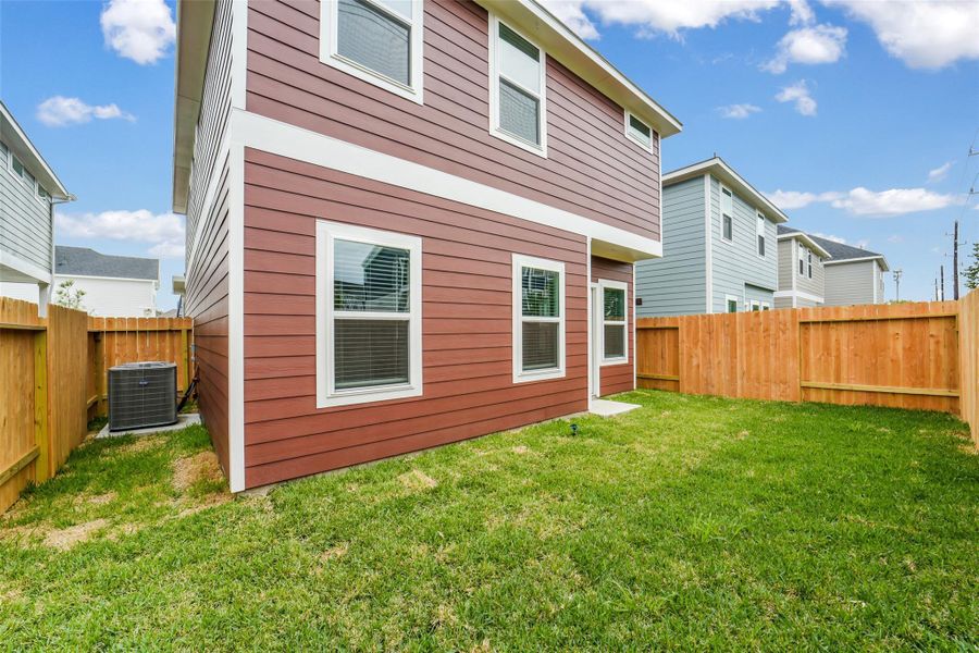 Exterior details and patio area of a home in , Houston (Image 3).