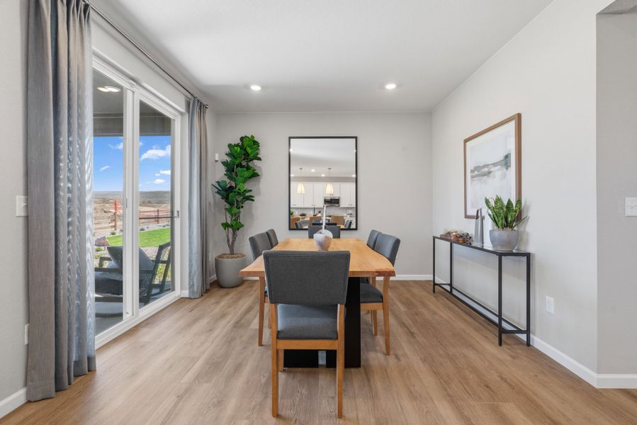 Representative furnished interior of a home built from the 4008 by Risewell Homes in Harvest Crossing, Aurora (Image 7).