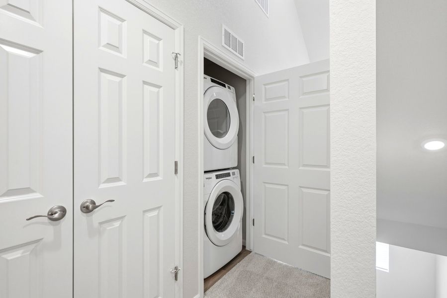 Furnished interior view inside a new home in Three Hills, Morrison (Image 9).