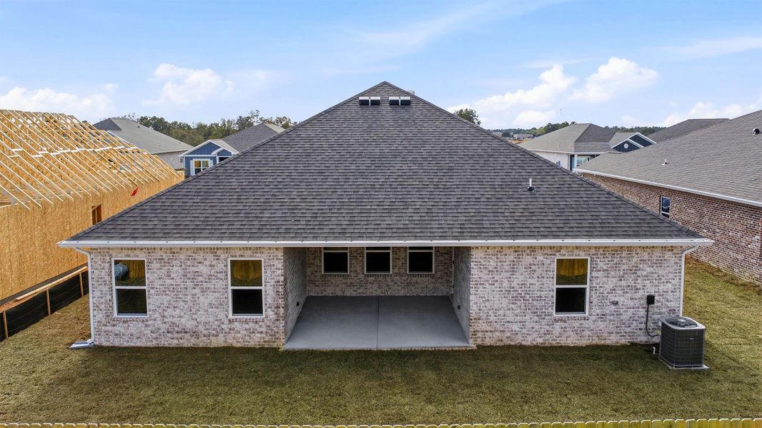 Exterior details and patio area of a home in Owl's Head Farms, Freeport (Image 3).
