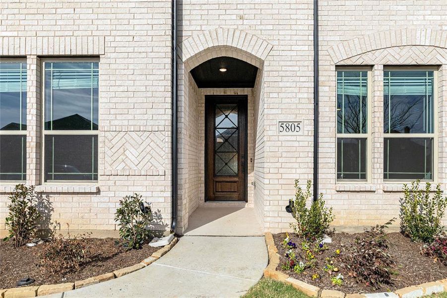 Exterior details and patio area of a home in Sutton Fields, Celina (Image 28).