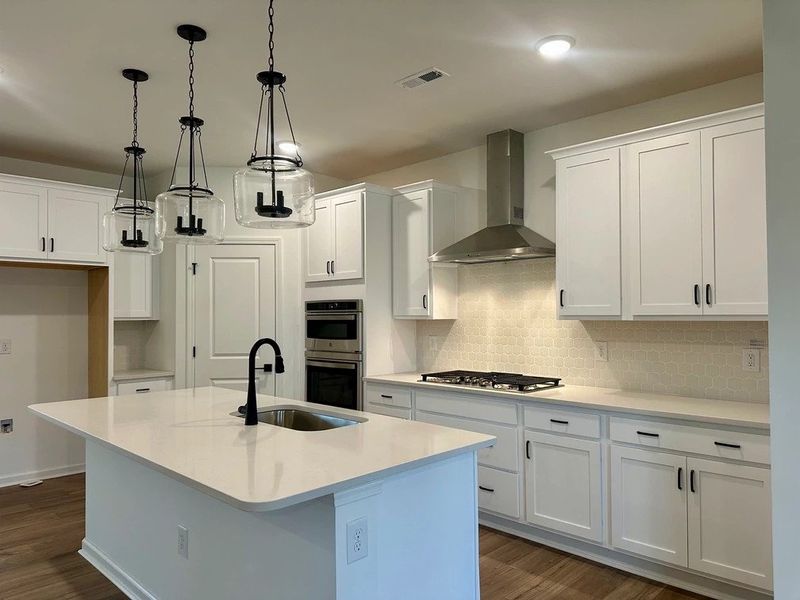 Kitchen featuring the AW Collection® Harmony - Smooth finishes and classic touches shine. Kitchen featuring the AW Collection® Harmony - Smooth finishes and classic touches shine.