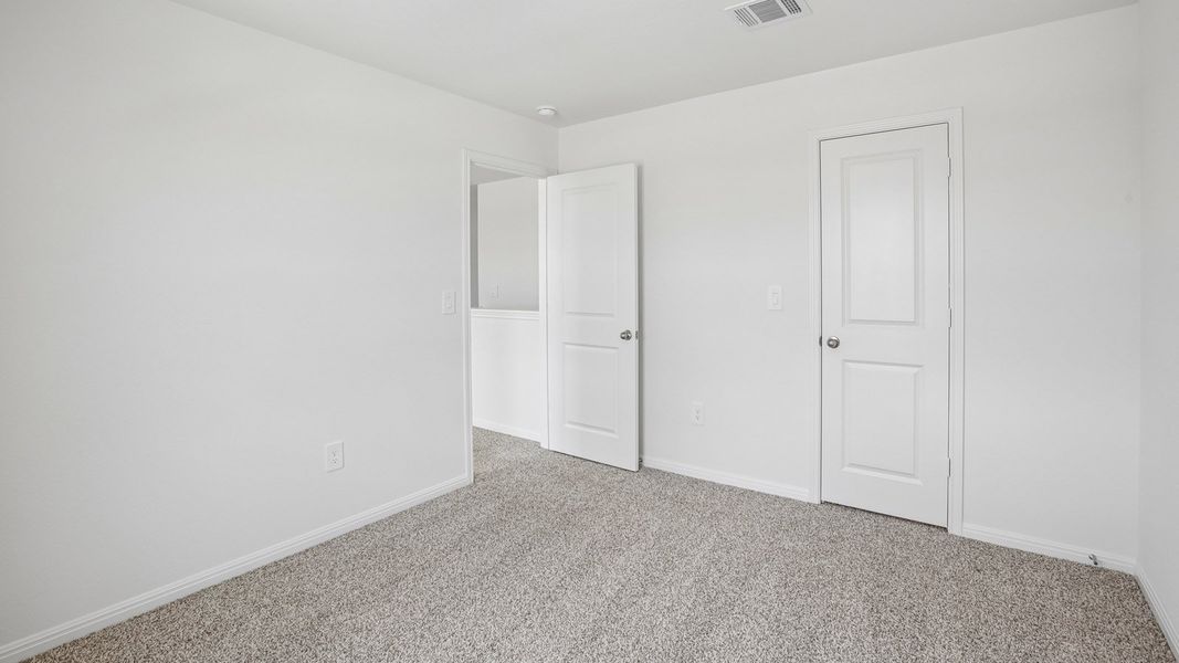 Spacious, unfurnished interior of a new home in Bar W Ranch, Leander (Image 33).