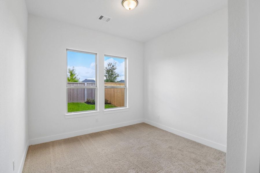 Spacious, unfurnished interior of a new home in The Grand Prairie 60', Hockley (Image 32).