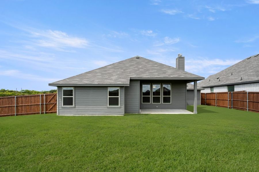 Representative exterior photo of a completed home built from the Walden by Impression Homes in Timberbrook, Justin, TX (Image 24).