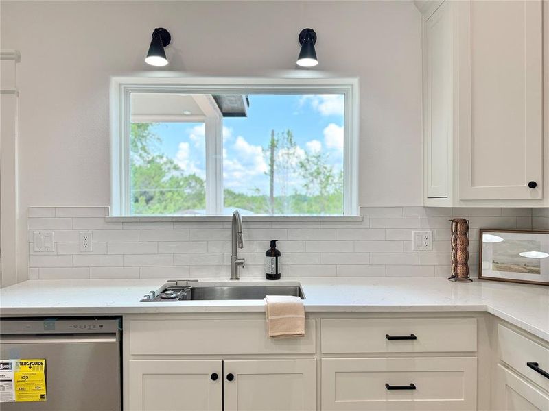 Large window overlooking the backyard Large window overlooking the backyard