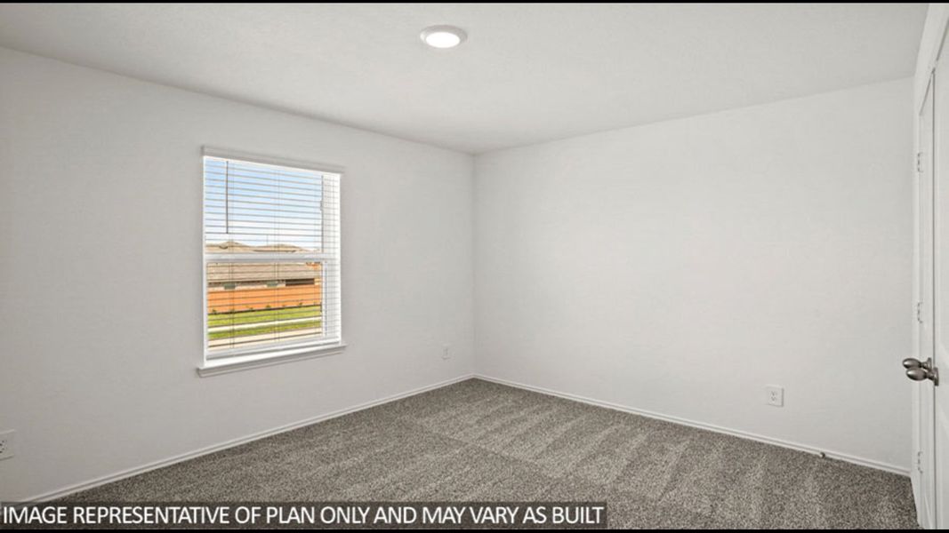 Representative unfurnished interior of a home built from the Midland by D.R. Horton in Sunterra, Katy (Image 24).