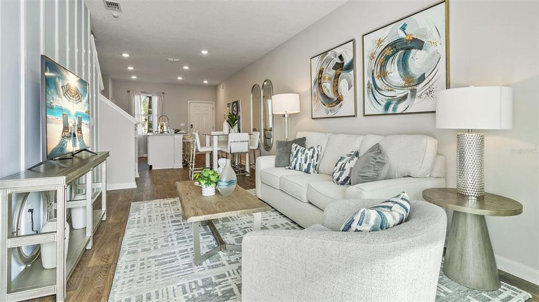 Furnished interior in a model home at Stokes Landing Express in St. Augustine (Image 9).