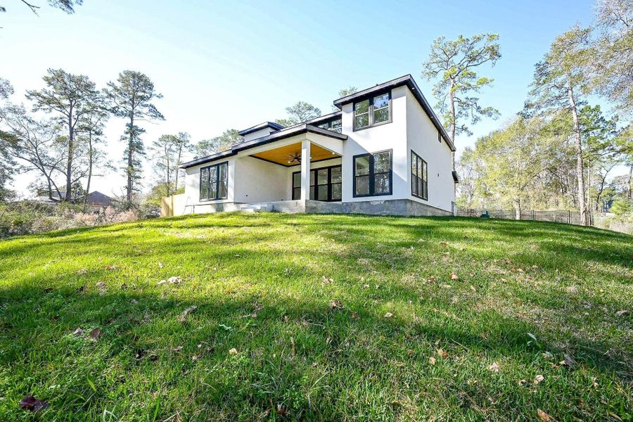 Exterior details and patio area of a home in , Humble (Image 26).