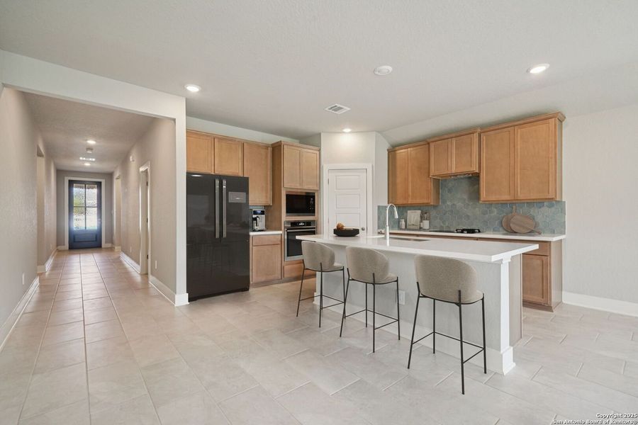 Furnished interior view inside a new home in Estancia Ranch - Classic Series, San Antonio (Image 4).
