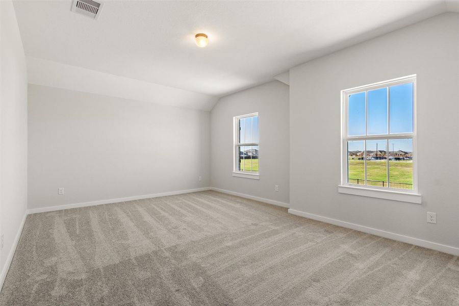 Spacious, unfurnished interior of a new home in Sunterra, Katy (Image 37).