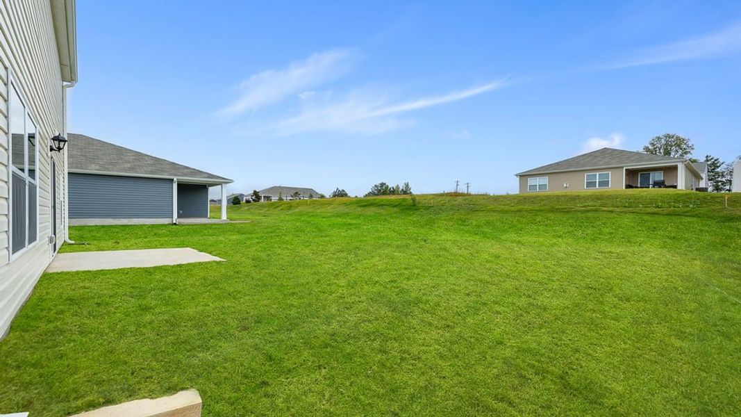 Exterior details and patio area of a home in Lakestone, Woodruff (Image 23).