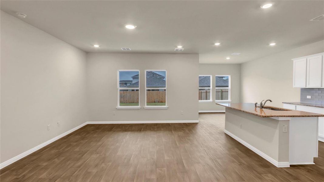 Spacious, unfurnished interior of a new home in Carillon, Manor (Image 18).