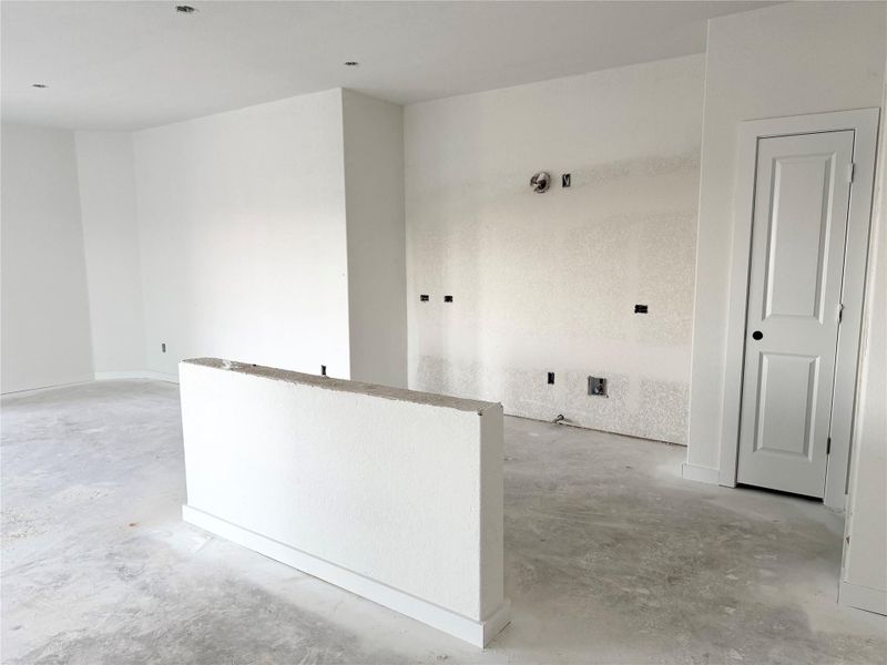 Empty room with concrete flooring Empty room with concrete flooring