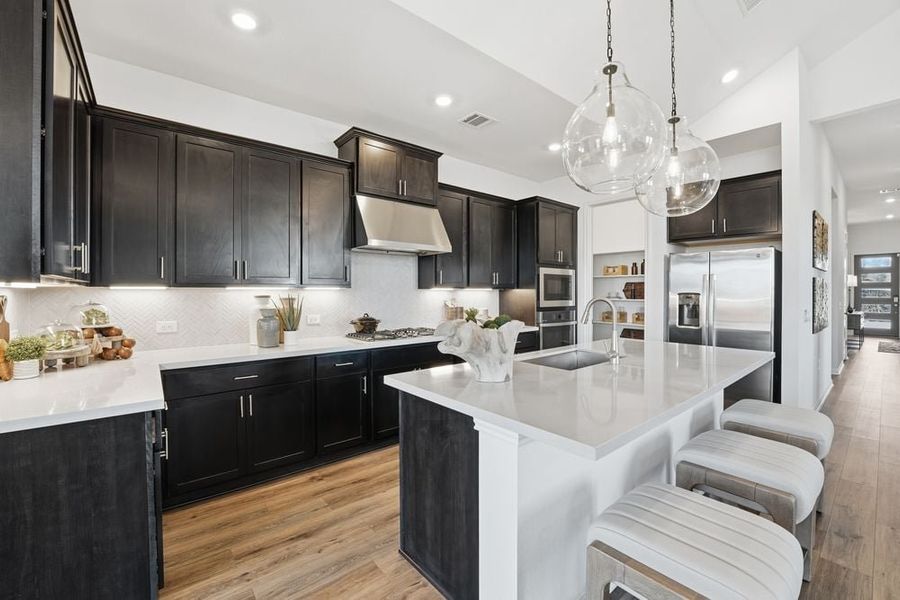 Representative furnished interior of a home built from the Burnet by Taylor Morrison in Village Grove, Dripping Springs (Image 4).