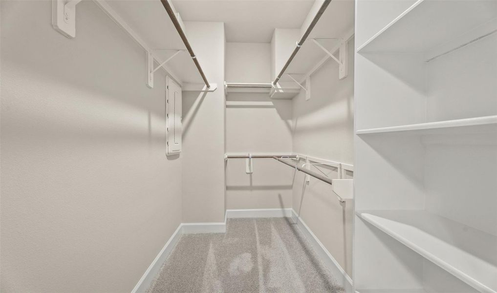 Primary suite walk-in closet (*Photo not of actual home and used for illustration purposes only.) Primary suite walk-in closet (*Photo not of actual home and used for illustration purposes only.)