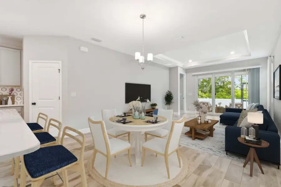 Furnished interior view inside a new home in Fairway Pointe - 55+ Villa Community, Sun City Center (Image 9).