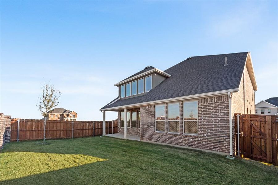 Exterior details and patio area of a home in Sutton Fields, Celina (Image 3).
