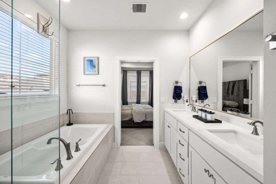 Furnished interior view inside a new home in The Corner At Buffalo Pointe, Houston (Image 12).