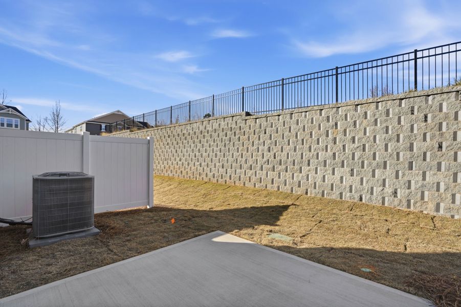 Exterior details and patio area of a home in Hedgecliff Townes, Kannapolis (Image 14).