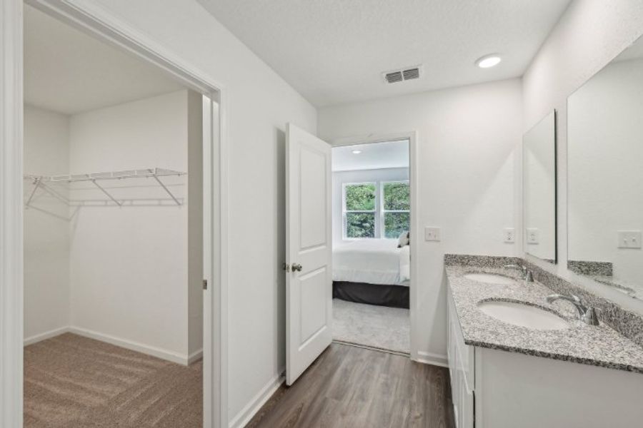 A bathroom with a sink and a bathtub. A bathroom with a sink and a bathtub.