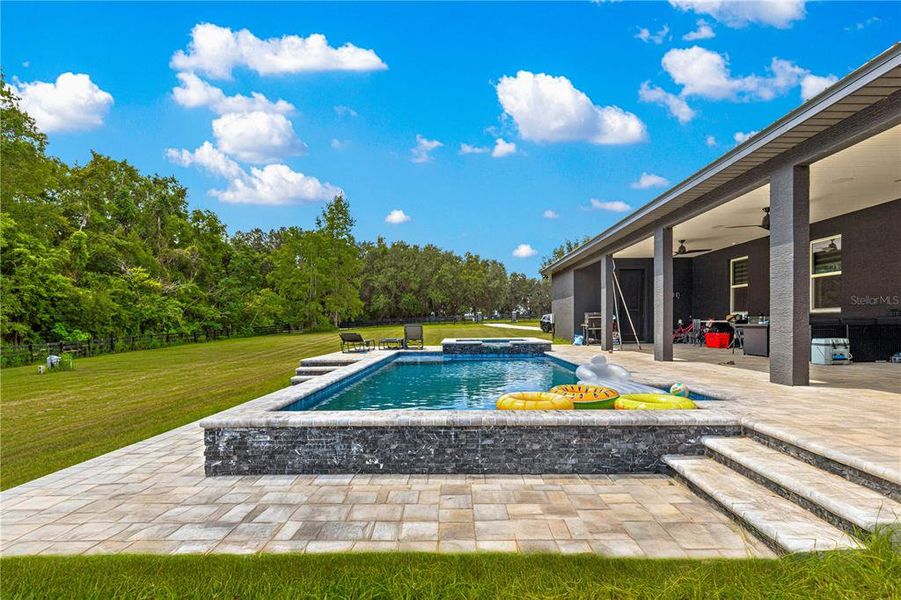 Front exterior of a new home in , Ocala, FL, highlighting curb appeal (Image 22). Front exterior of a new home in , Ocala, FL, highlighting curb appeal (Image 22).