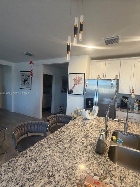 Furnished interior view inside a new home in , Haines City (Image 12).