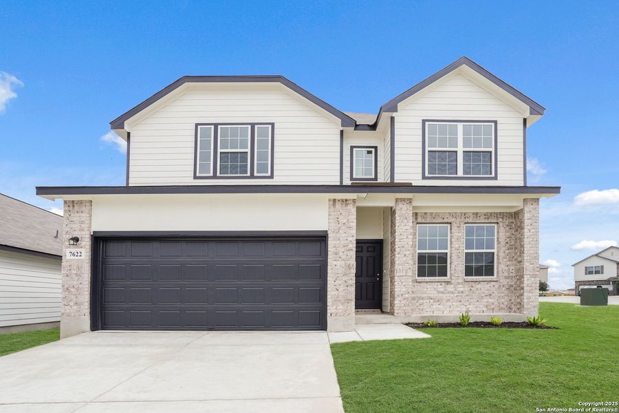 Front exterior of a new home in Cinco Lakes, San Antonio, TX, highlighting curb appeal (Image 17). Front exterior of a new home in Cinco Lakes, San Antonio, TX, highlighting curb appeal (Image 17).