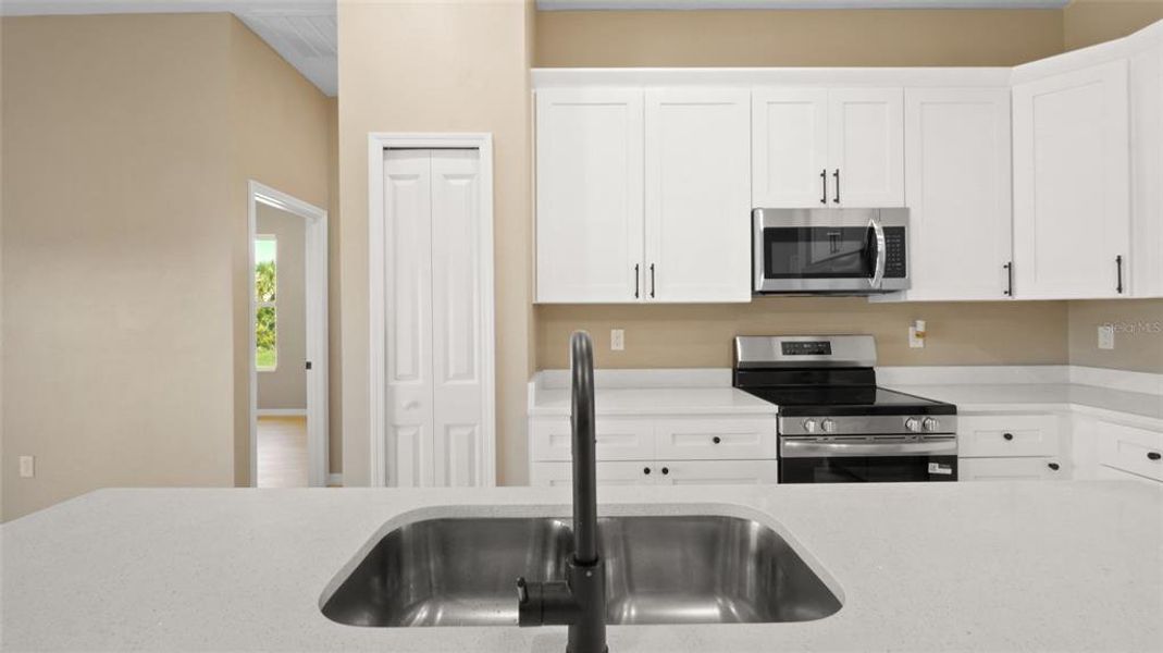 Furnished interior view inside a new home in , Port Charlotte (Image 8).